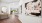 hallways with art and a mirror